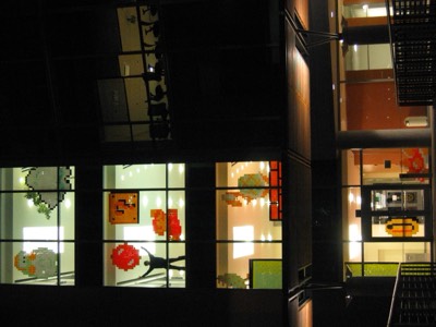 The finished Post-it Mario installation lit up at night