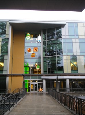 Concept mockup: sprites overlaid on the building facade